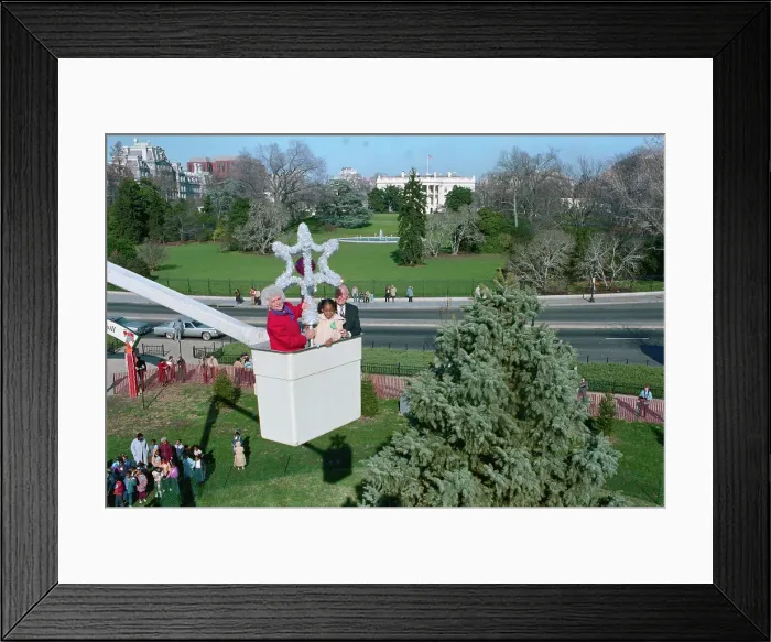 Framed Print : Barbara Bush Riding in Basket Holding Star Framed Print : Barbara Bush Riding in Basket Holding Star
