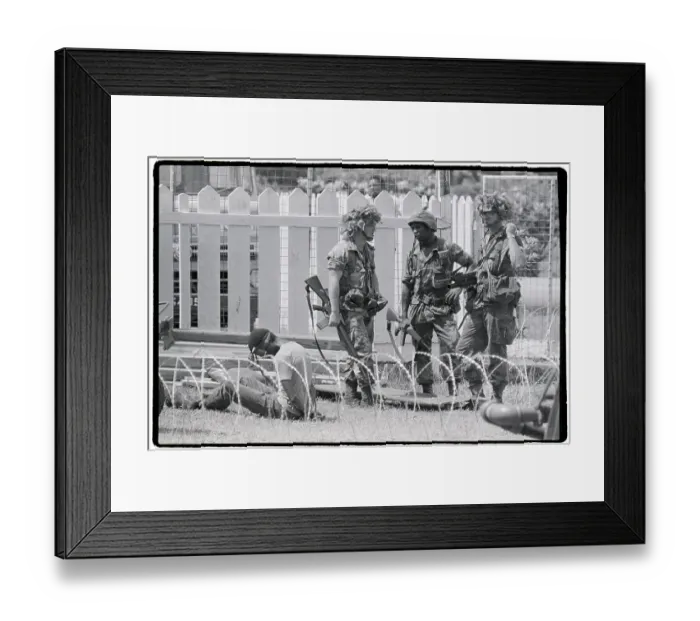 Framed Print : US Soldiers Guarding Prisoner