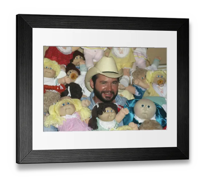 Framed Print : Xavier Roberts Sitting in Cabbage Patch Dolls Framed Print : Xavier Roberts Sitting in Cabbage Patch Dolls