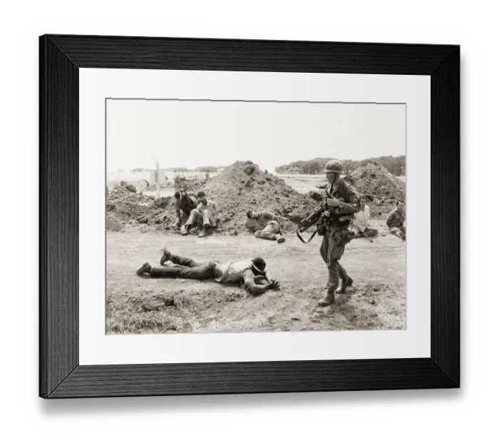 Framed Print : US Soldier Guarding Prisoners Framed Print : US Soldier Guarding Prisoners