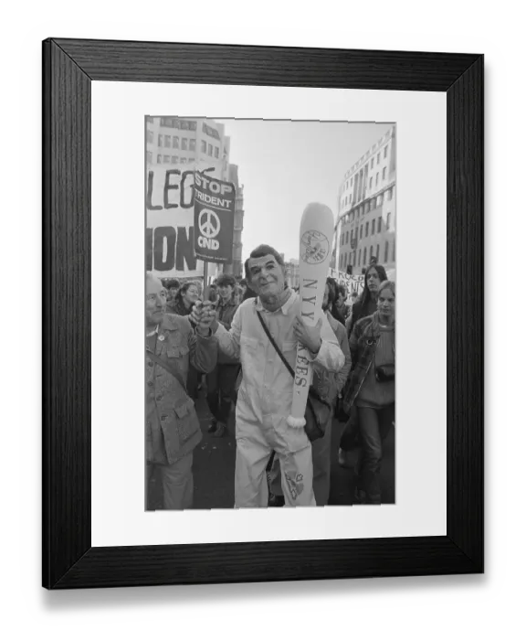 Framed Print : Protester Wearing Reagan Mask Framed Print : Protester Wearing Reagan Mask
