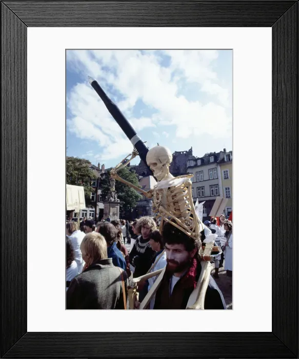 Framed Print : Man Carrying a Skeleton Framed Print : Man Carrying a Skeleton