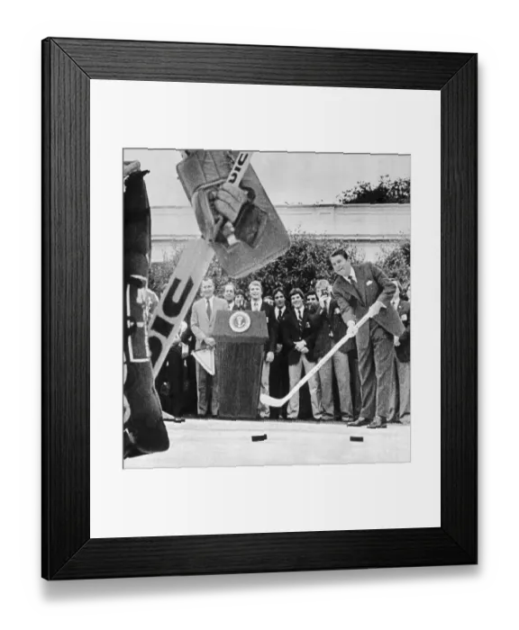 Framed Print : Ronald Reagan Shooting Hockey Puck Framed Print : Ronald Reagan Shooting Hockey Puck
