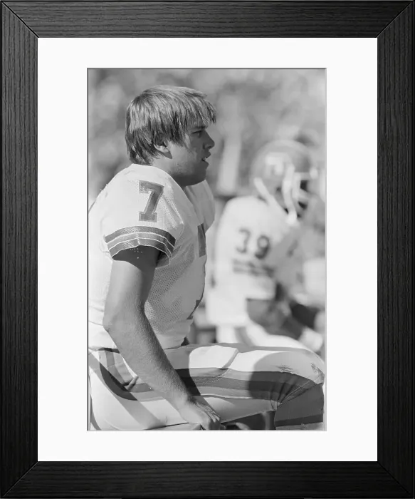 Framed Print : John Elway Sitting on Sidelines in Uniform Framed Print : John Elway Sitting on Sidelines in Uniform