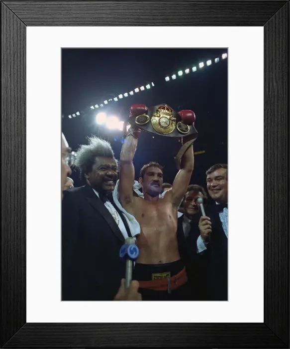 Framed Print : Gerrie Coetzee Displaying Belt