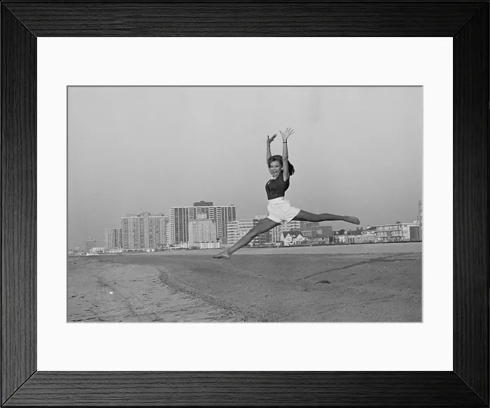 Framed Print : Vanessa Williams Leaping Through the Air on Beach Framed Print : Vanessa Williams Leaping Through the Air on Beach