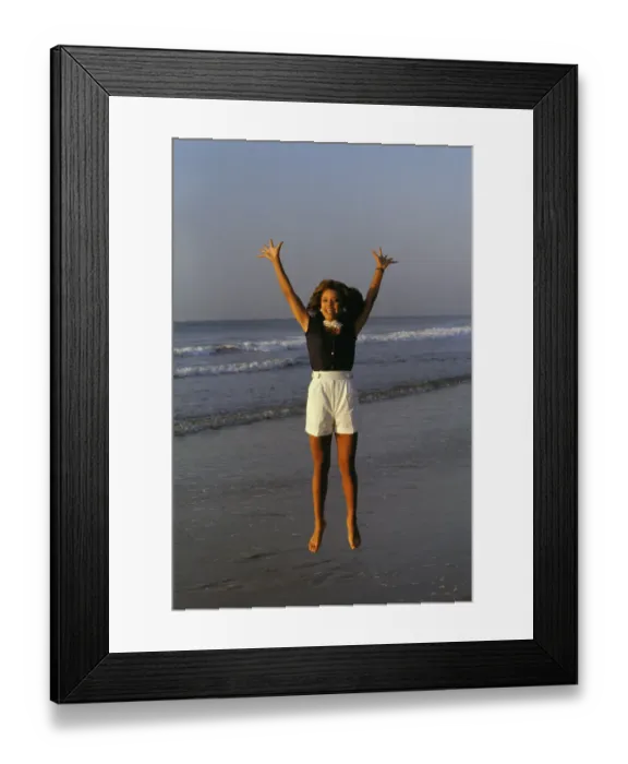 Framed Print : Vanessa Williams Jumping on Beach Framed Print : Vanessa Williams Jumping on Beach