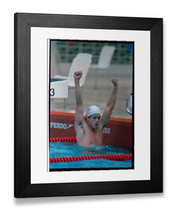 Framed Print : Rick Carey Holding His Arms in Victory]