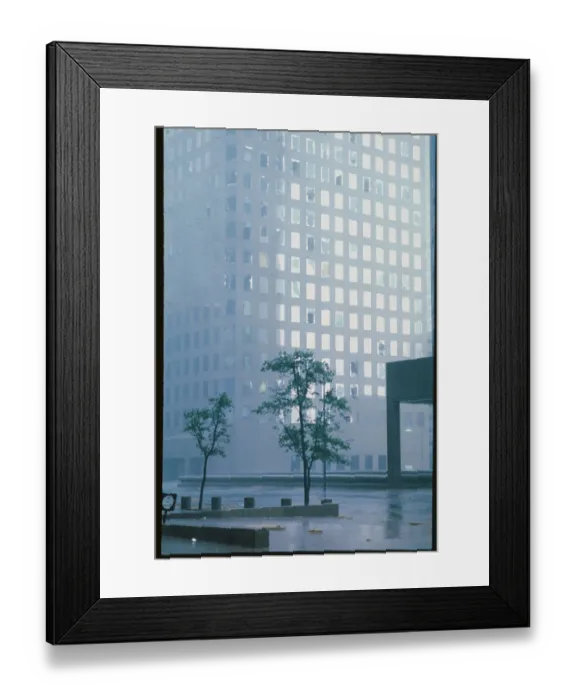 Framed Print : Wet Streets and Skyscraper with Blown out Windows Framed Print : Wet Streets and Skyscraper with Blown out Windows