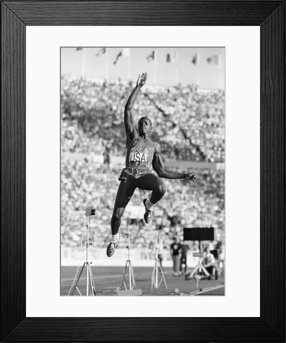 Framed Print : Carl Lewis In Mid-Air Doing Long Jump Framed Print : Carl Lewis In Mid-Air Doing Long Jump