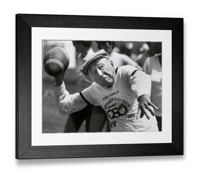 Framed Print : Football Thrower in Senior Olympics Framed Print : Football Thrower in Senior Olympics