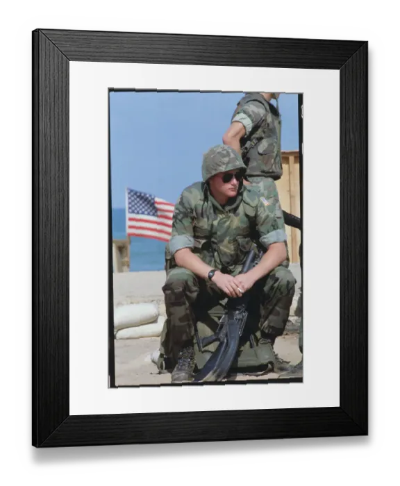 Framed Print : Soldiers Relaxing near American Flag Framed Print : Soldiers Relaxing near American Flag