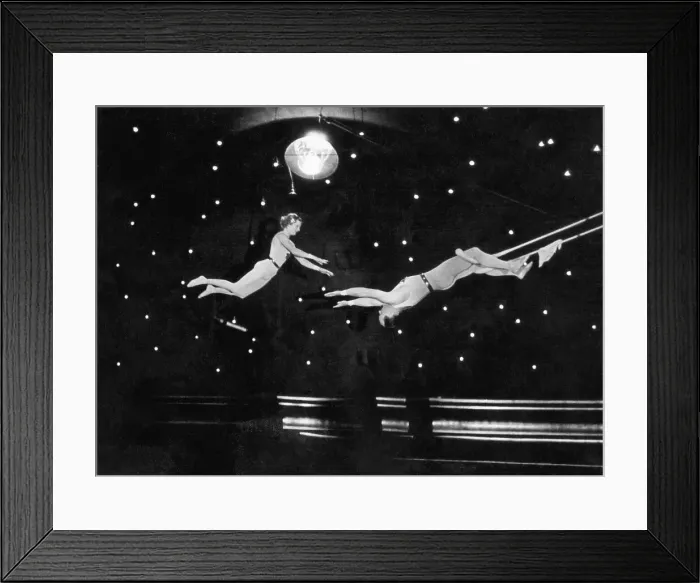 Framed Print : Trapeze Artists Performing in Circus Framed Print : Trapeze Artists Performing in Circus