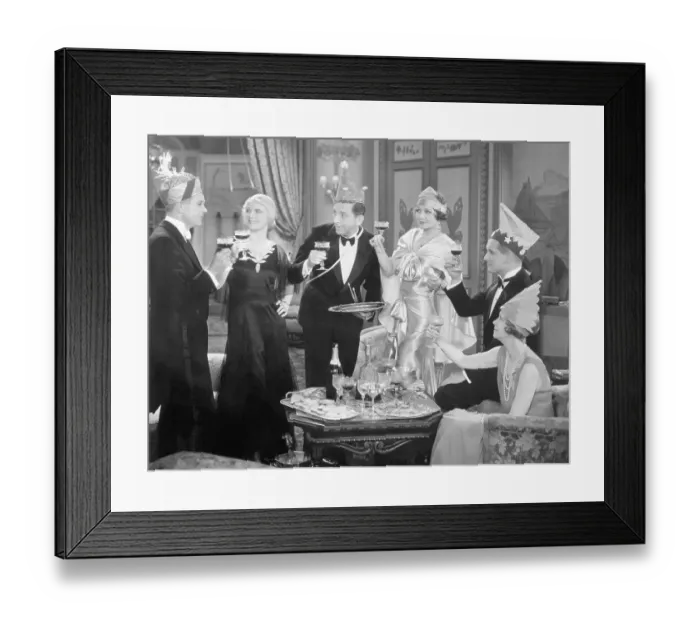 Framed Print : Group Toasts At Holiday Party Framed Print : Group Toasts At Holiday Party
