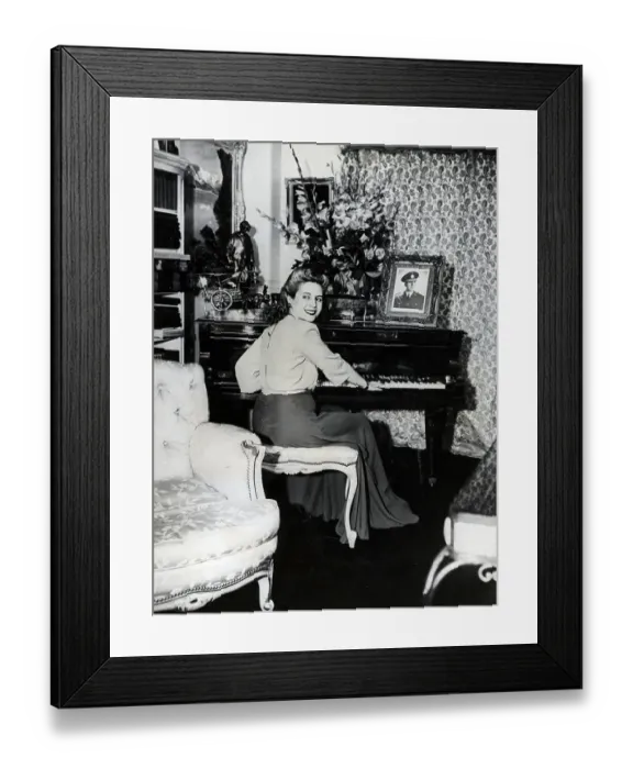Framed Print : Eva Peron Playing The Piano Framed Print : Eva Peron Playing The Piano