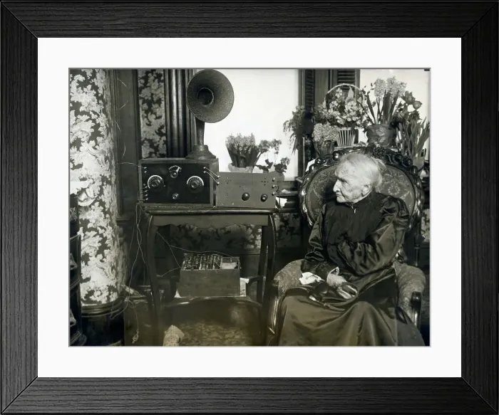 Framed Print : Elderly Woman Listening to Radio Framed Print : Elderly Woman Listening to Radio
