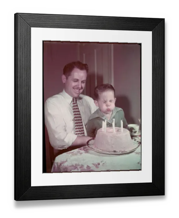 Framed Print : Boy Blowing Out Birthday Candles Framed Print : Boy Blowing Out Birthday Candles