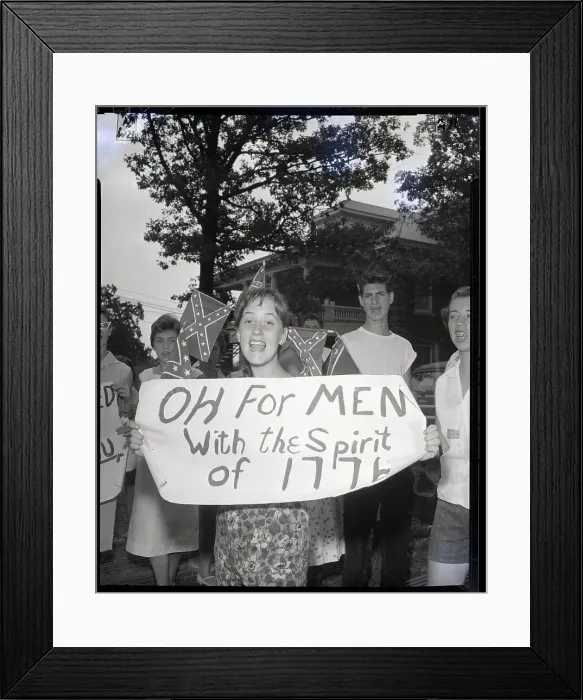 Framed Print : Racist Holds Anti-Integration Sign Framed Print : Racist Holds Anti-Integration Sign