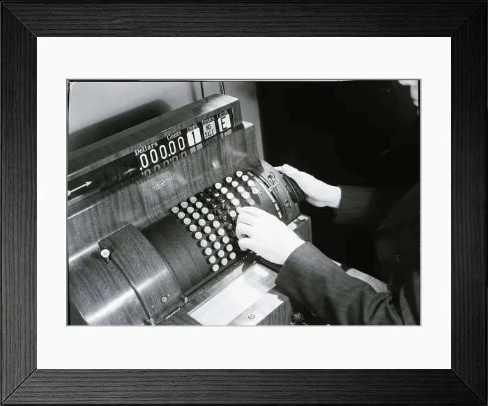 Framed Print : Hands Pushing Buttons On A Cash Register Framed Print : Hands Pushing Buttons On A Cash Register