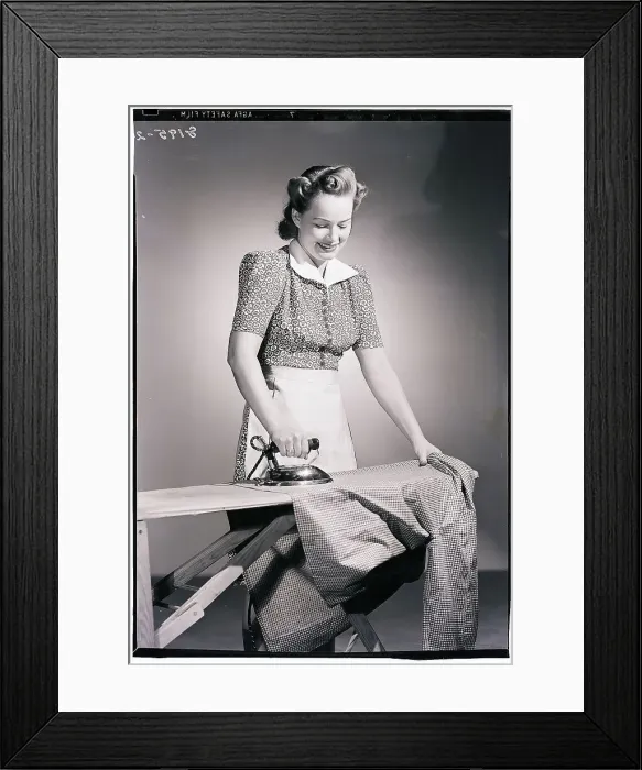 Framed Print : Woman in Apron Ironing Framed Print : Woman in Apron Ironing