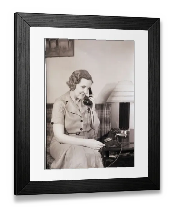 Framed Print : Woman Using Telephone Framed Print : Woman Using Telephone