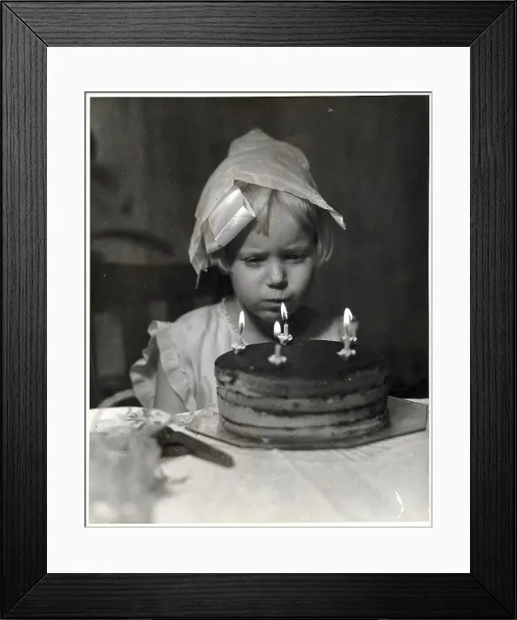Framed Print : Girl Blowing Birthday Candles Framed Print : Girl Blowing Birthday Candles