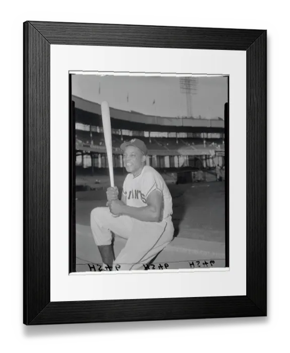 Framed Print : Willie Mays Sitting on Ledge and Holding Bat Framed Print : Willie Mays Sitting on Ledge and Holding Bat