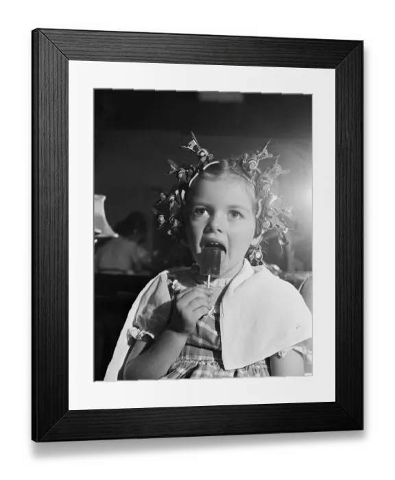Framed Print : Girl With Hair Curlers Licking Lollipop Framed Print : Girl With Hair Curlers Licking Lollipop