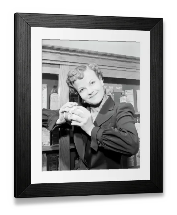 Framed Print : Woman Holding An Atom-Expanding Device Framed Print : Woman Holding An Atom-Expanding Device