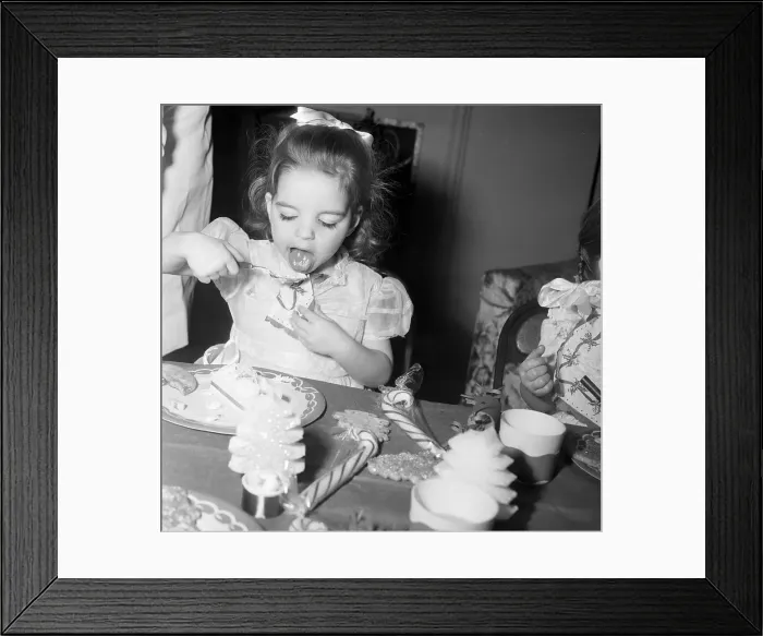 Framed Print : Liza Minnelli as Child Eating Ice Cream Framed Print : Liza Minnelli as Child Eating Ice Cream