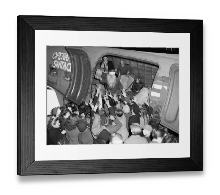 Framed Print : Army Santa Gives Gifts Out of Plane Framed Print : Army Santa Gives Gifts Out of Plane