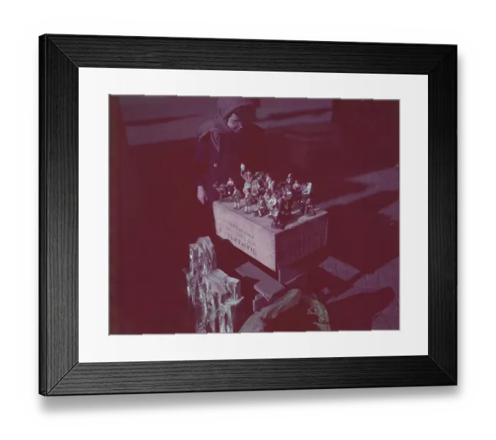 Framed Print : Boy Observing Christmas Figurines Framed Print : Boy Observing Christmas Figurines
