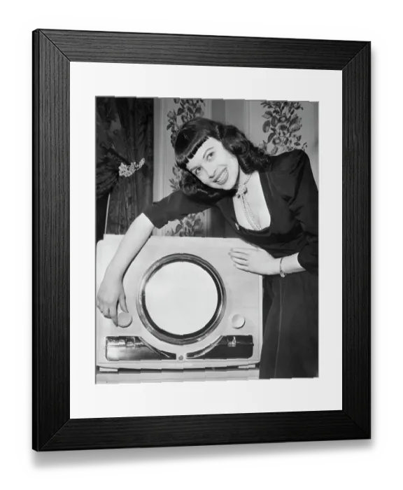 Framed Print : Woman Demonstrating New Television Framed Print : Woman Demonstrating New Television