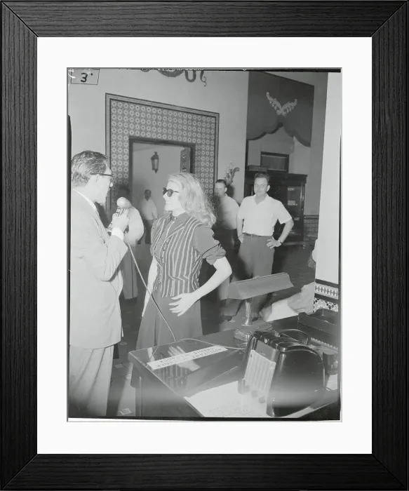 Framed Print : Rita Hayworth Speaking to Reporter Framed Print : Rita Hayworth Speaking to Reporter