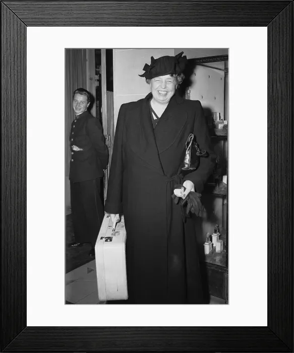 Framed Print : Eleanor Roosevelt Smiling and Carrying her Suitcase Framed Print : Eleanor Roosevelt Smiling and Carrying her Suitcase