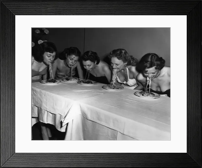 Framed Print : Broadway Showgirls Eating Spaghetti in a Competition Framed Print : Broadway Showgirls Eating Spaghetti in a Competition