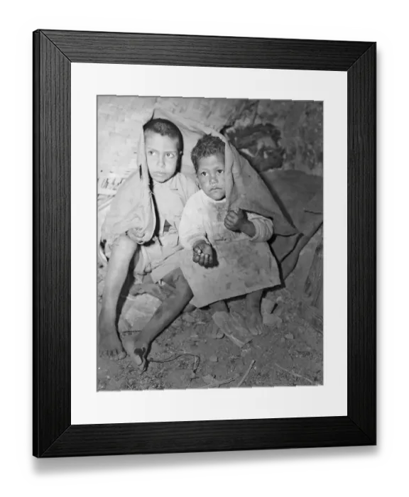 Framed Print : Young Arabs Share Sack For Protection Framed Print : Young Arabs Share Sack For Protection