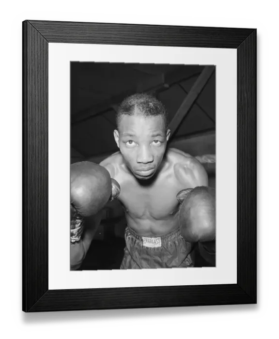 Framed Print : Sandy Saddler Posing with Raised Fists Framed Print : Sandy Saddler Posing with Raised Fists