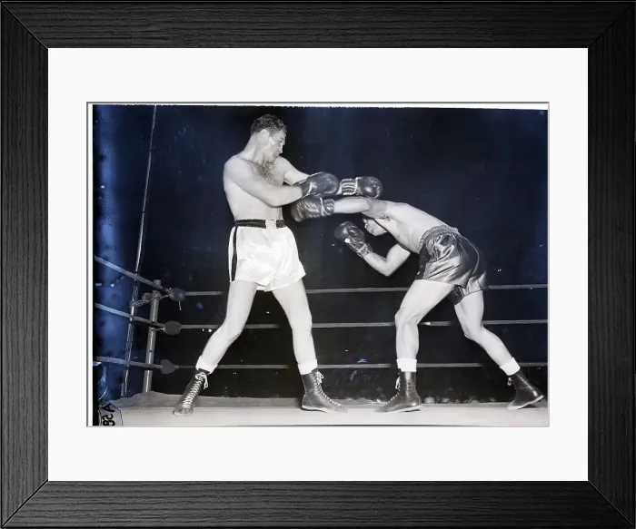 Framed Print : Joe Louis Launches Left at Opponent Framed Print : Joe Louis Launches Left at Opponent