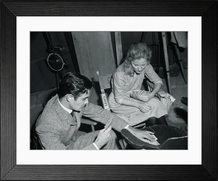 Framed Print : Joan Fontaine Playing Cards With Louis Jourdan Framed Print : Joan Fontaine Playing Cards With Louis Jourdan
