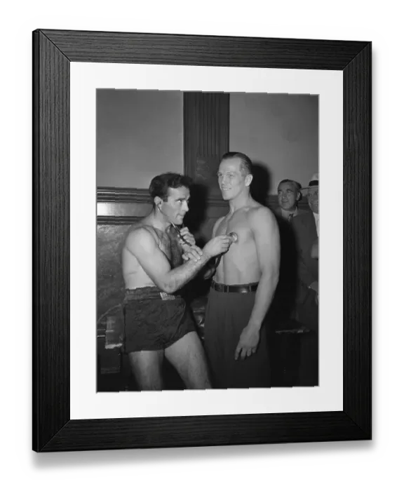 Framed Print : Marcel Cerdan Using Stethoscope on Tony Zale