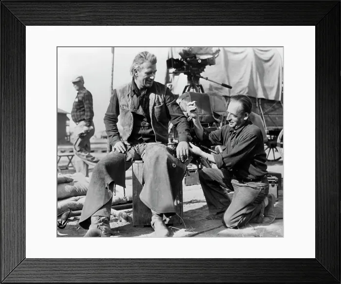 Framed Print : Tailor on Set Mending John Wayne's Shirt Framed Print : Tailor on Set Mending John Wayne's Shirt