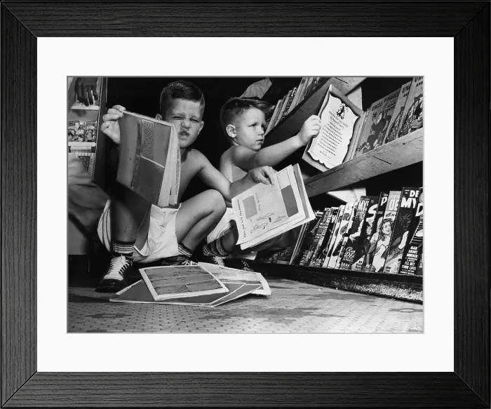 Framed Print : Two Boys Look at Comic Books Framed Print : Two Boys Look at Comic Books
