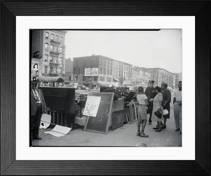 Framed Print : Police Officer Next To Evicted Goods Framed Print : Police Officer Next To Evicted Goods