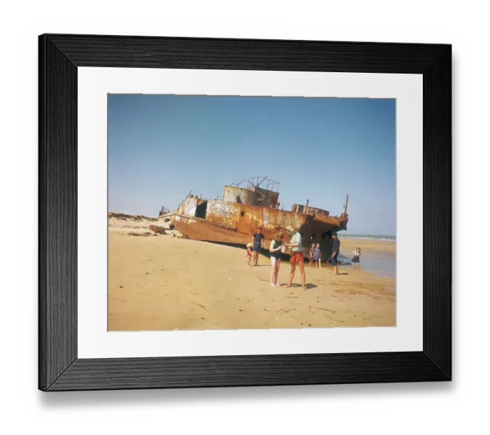 Framed Print : Family Standing On A Beach