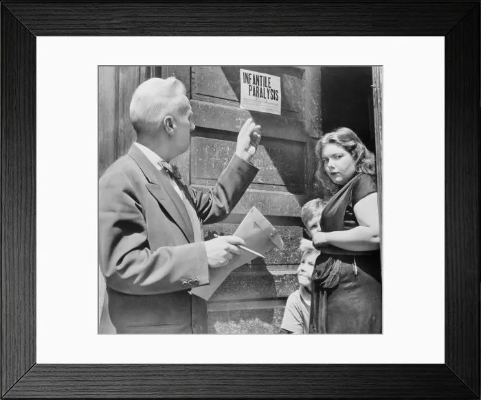 Framed Print : Doctor Placing Quarantine Sign on Family Framed Print : Doctor Placing Quarantine Sign on Family