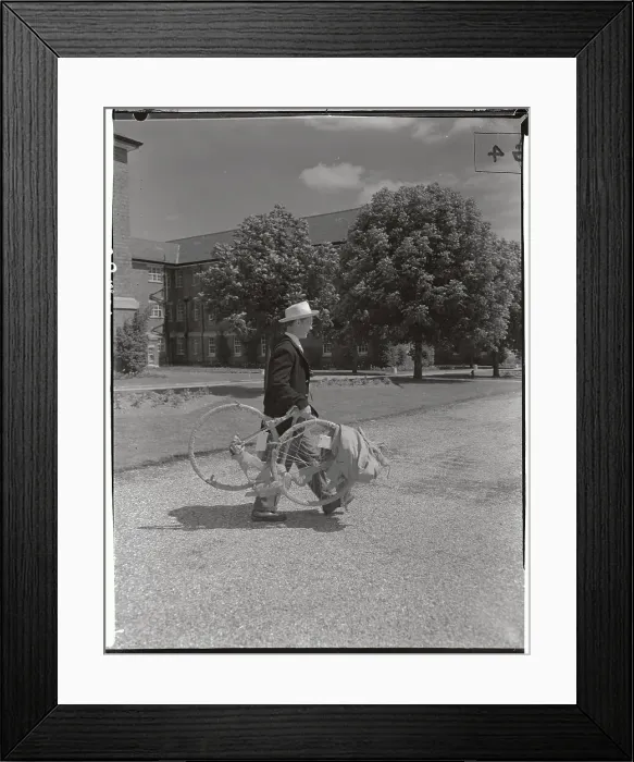 Framed Print : Edward Lynch Carrying Wrapped Bicycle Framed Print : Edward Lynch Carrying Wrapped Bicycle