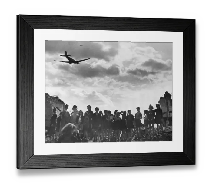Framed Print : Children Watch Food Airlift Plane Arrive Framed Print : Children Watch Food Airlift Plane Arrive