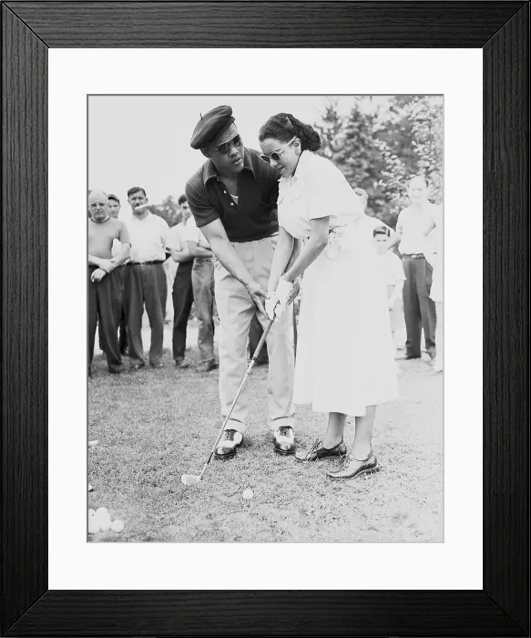 Framed Print : The Champ Teaches His Wife to Putt Framed Print : The Champ Teaches His Wife to Putt