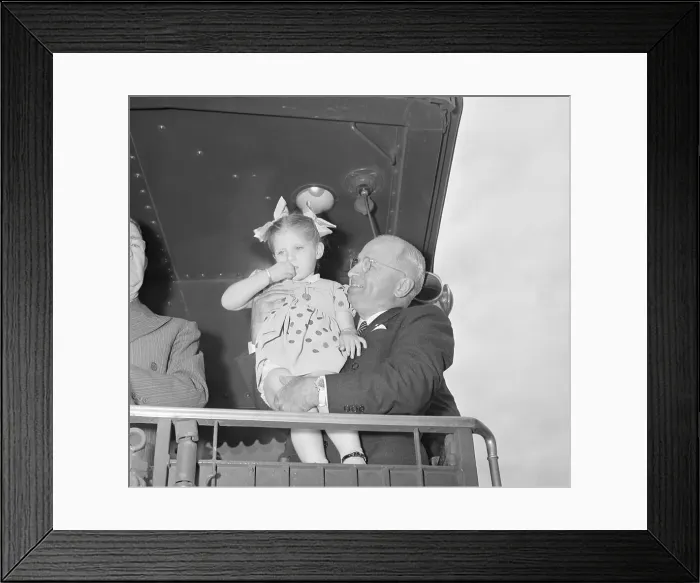 Framed Print : Truman Holding Little Girl Framed Print : Truman Holding Little Girl